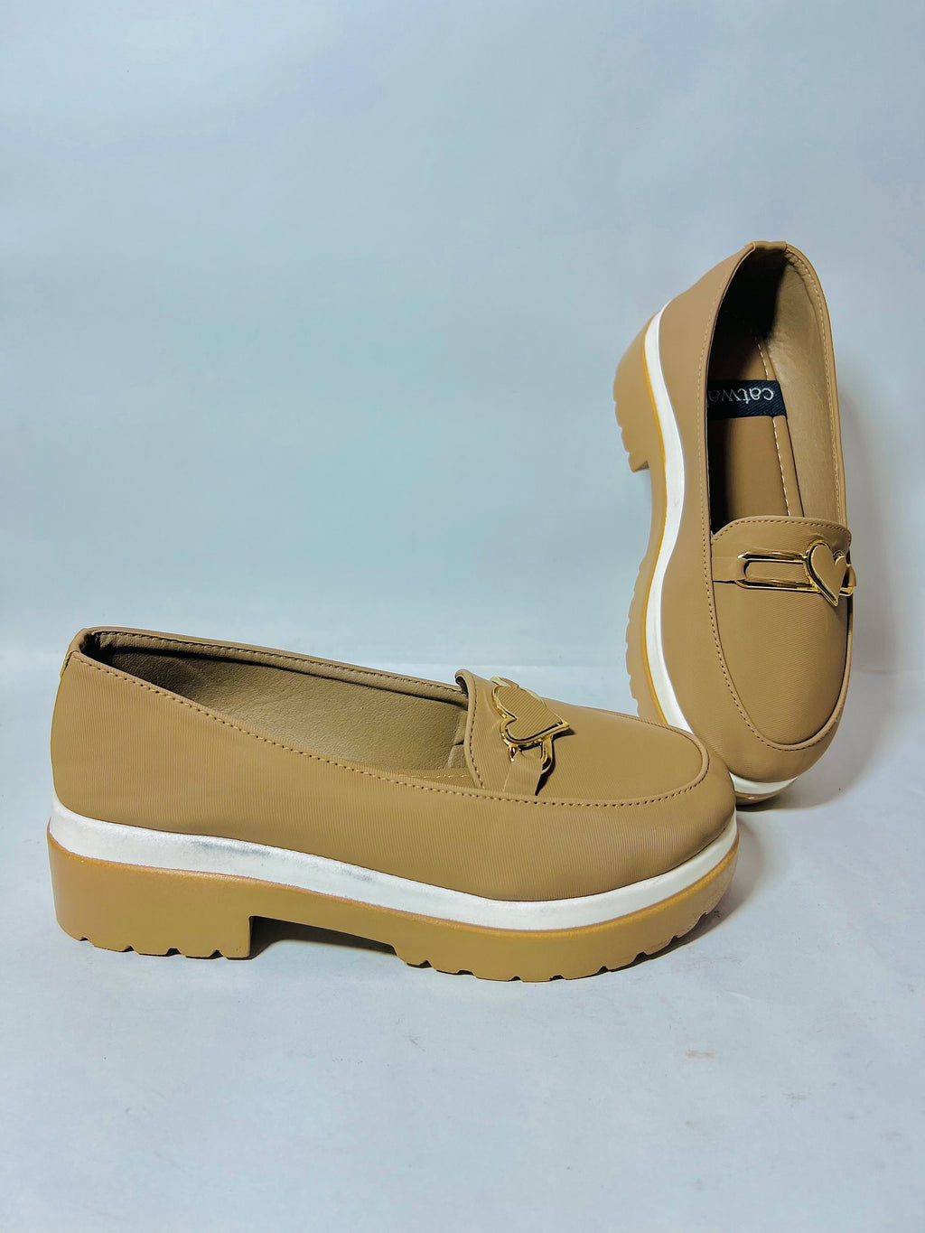 Chunky Sole Loafers: Beige Elegance with Modern Hardware.